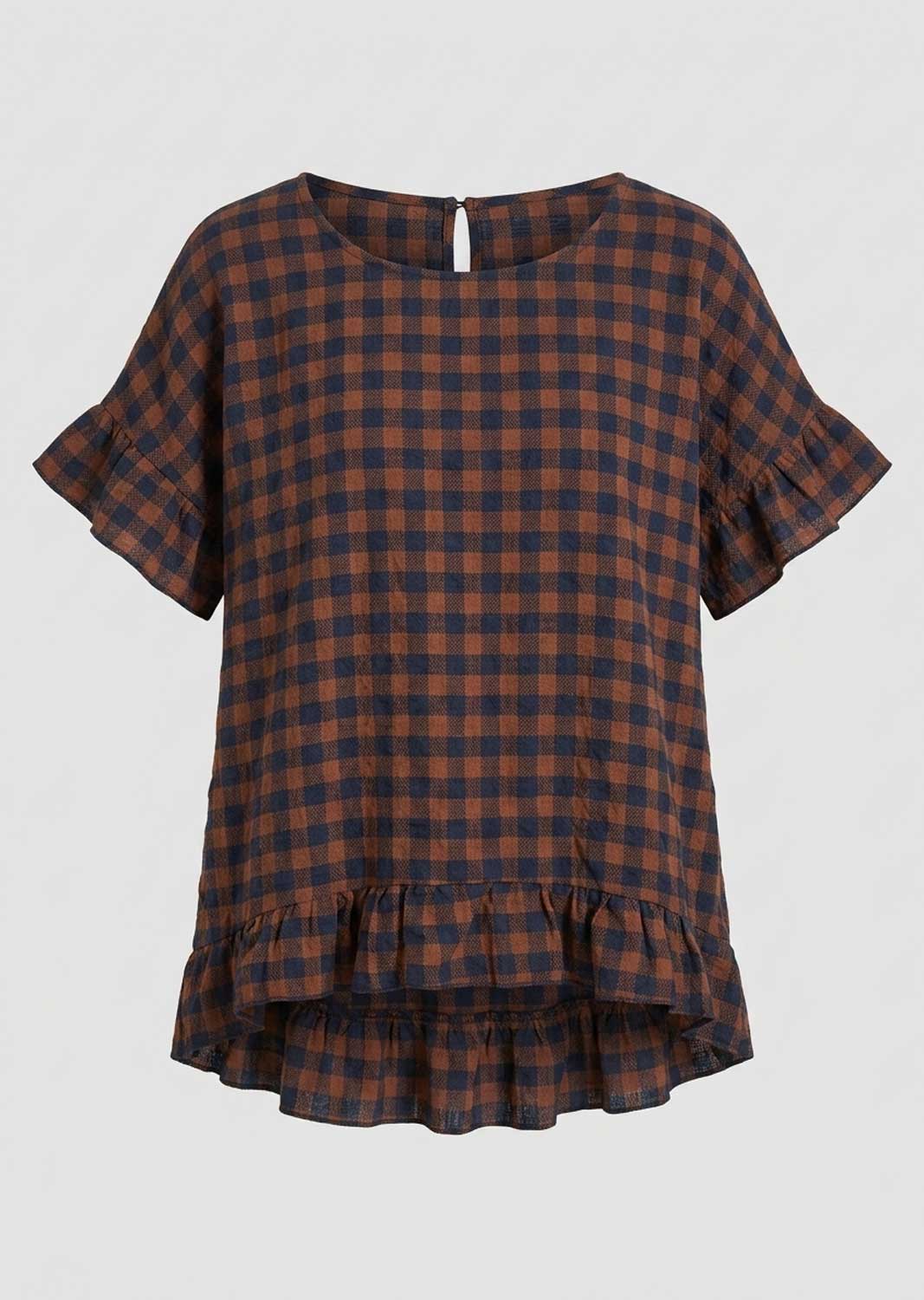 A short-sleeve plaid top with ruffled sleeves and a ruffled hem, shown against a light gray background. The pattern is a mix of dark brown and navy blue.