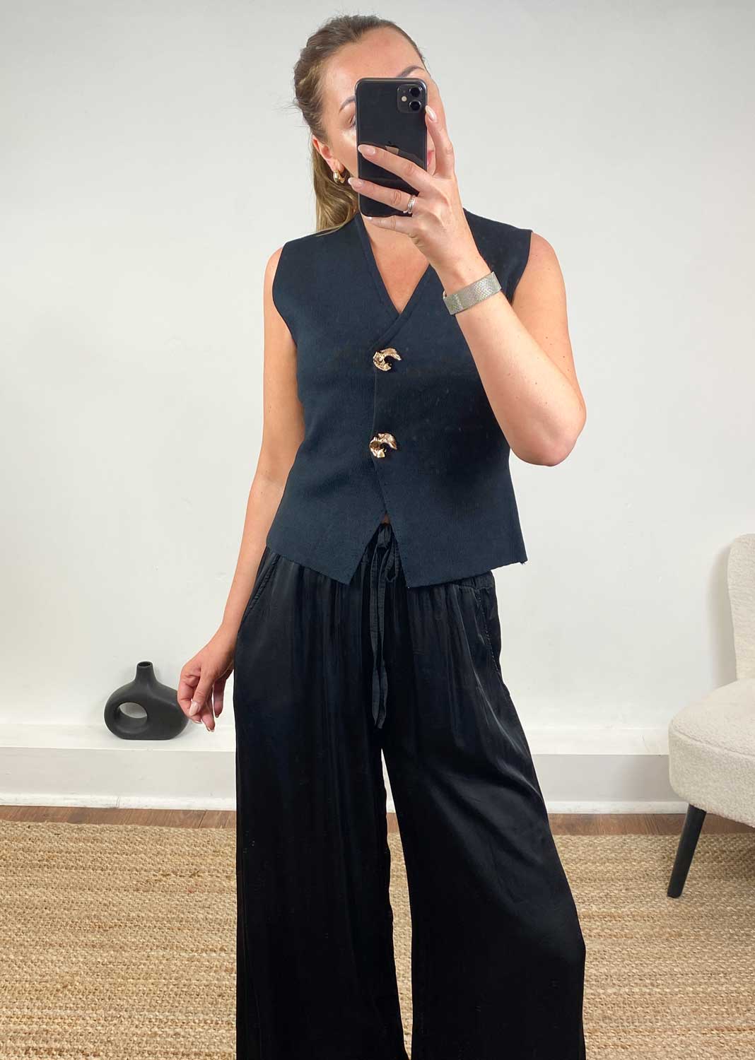 Black waistcoat with gold buttons 