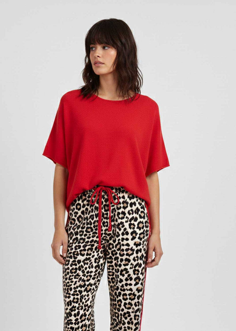 red knitted batwing top 