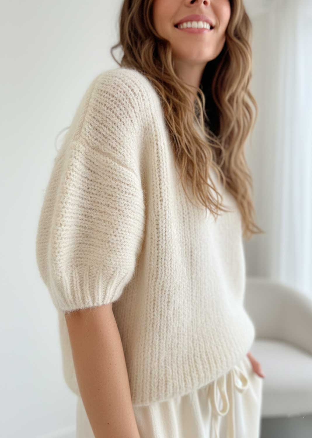 cream fluffy knit top