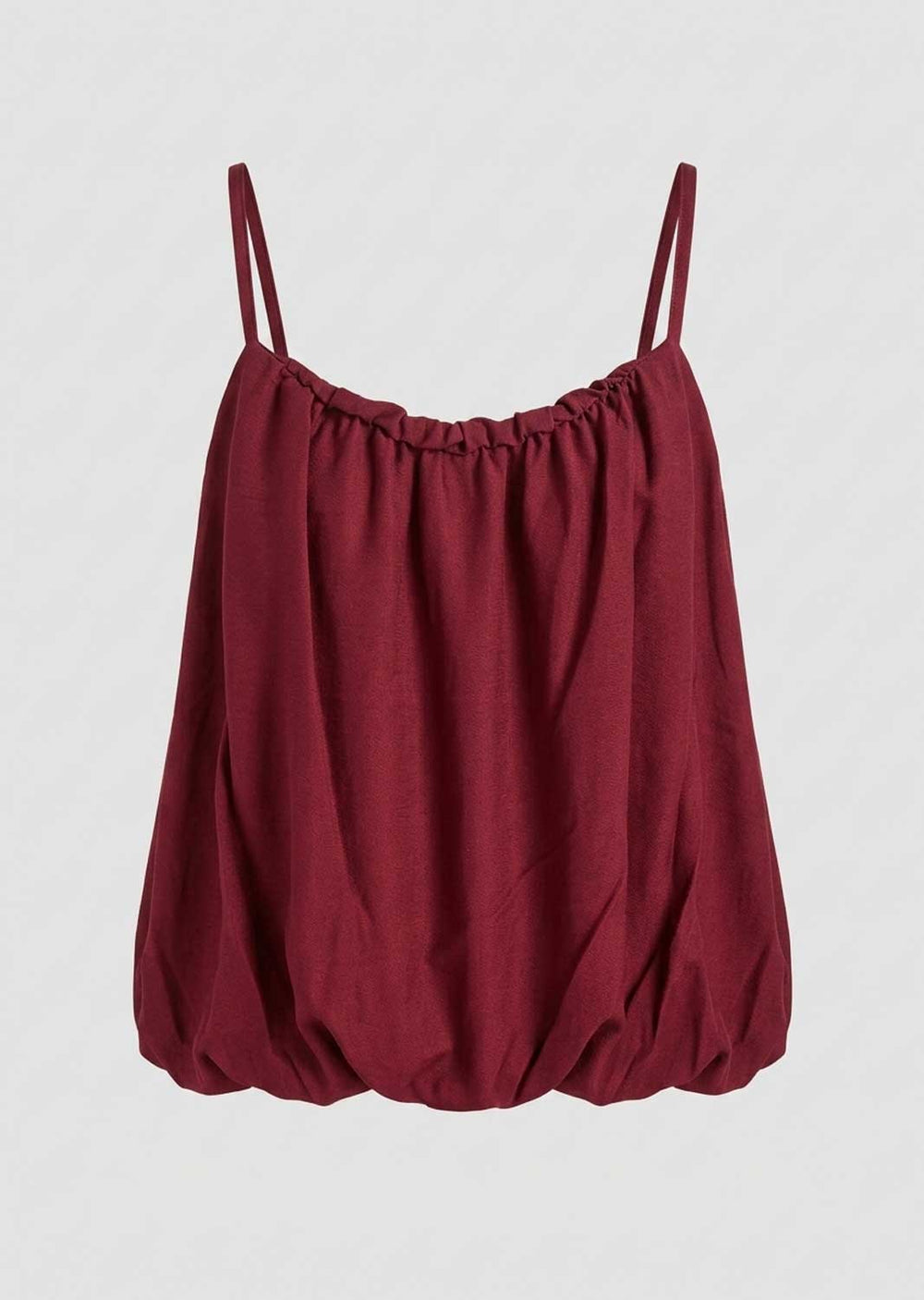 A burgundy spaghetti-strap top with a gathered, balloon-like silhouette