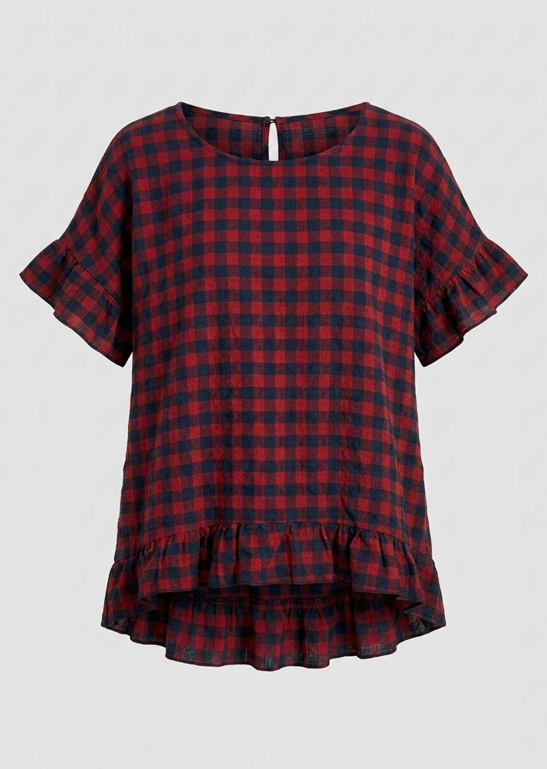 A red and navy blue checkered short-sleeve blouse with ruffled sleeves and a ruffled high-low hem, shown against a light gray background.